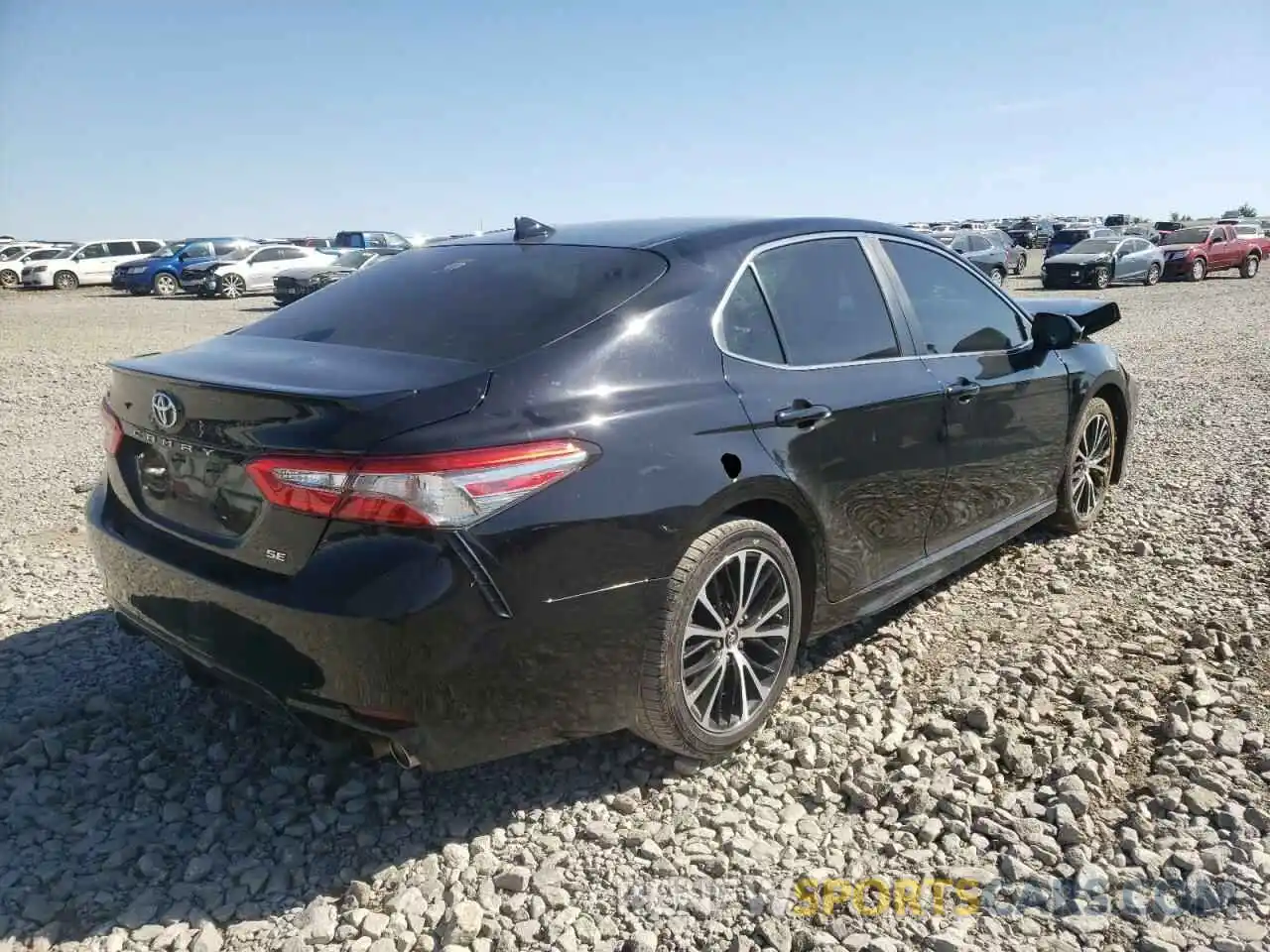 4 Photograph of a damaged car 4T1B11HK6KU718984 TOYOTA CAMRY 2019