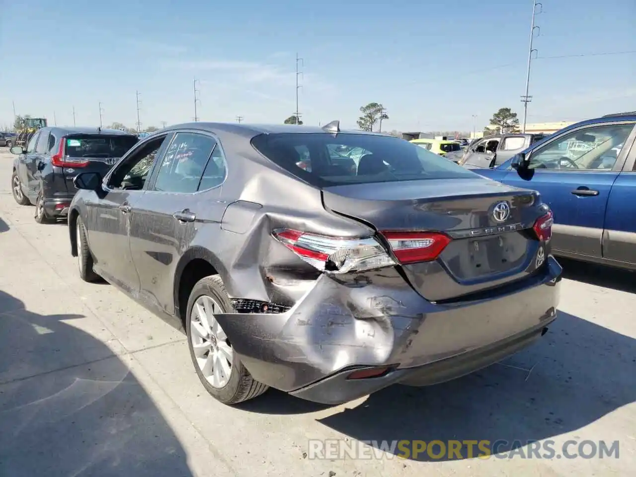 3 Photograph of a damaged car 4T1B11HK6KU719309 TOYOTA CAMRY 2019