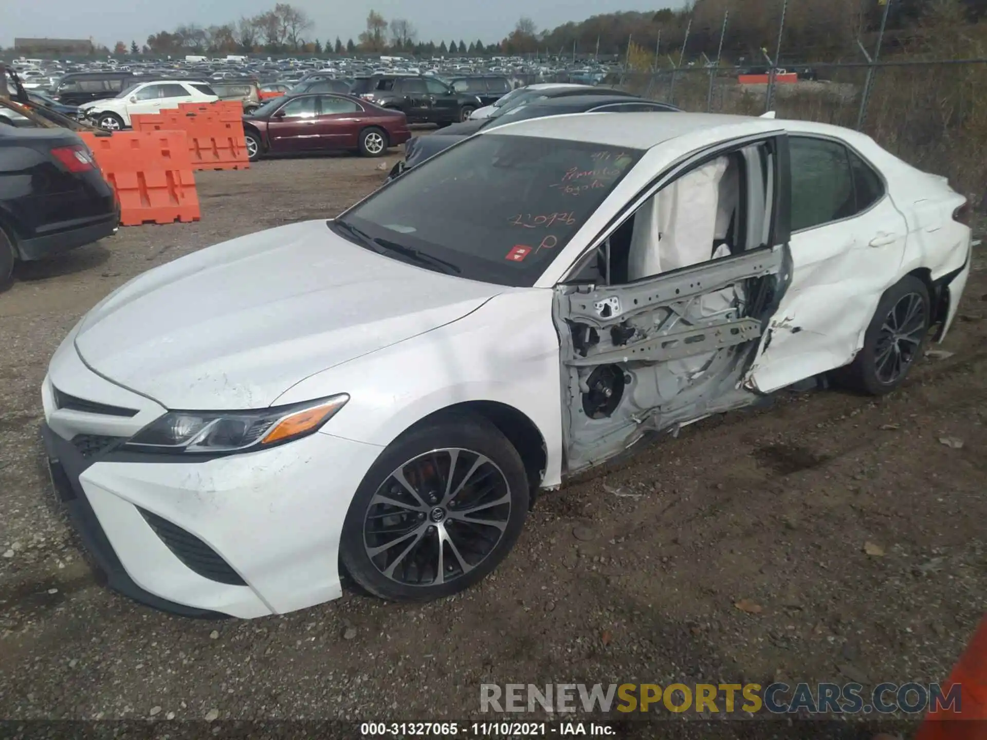 2 Photograph of a damaged car 4T1B11HK6KU720976 TOYOTA CAMRY 2019