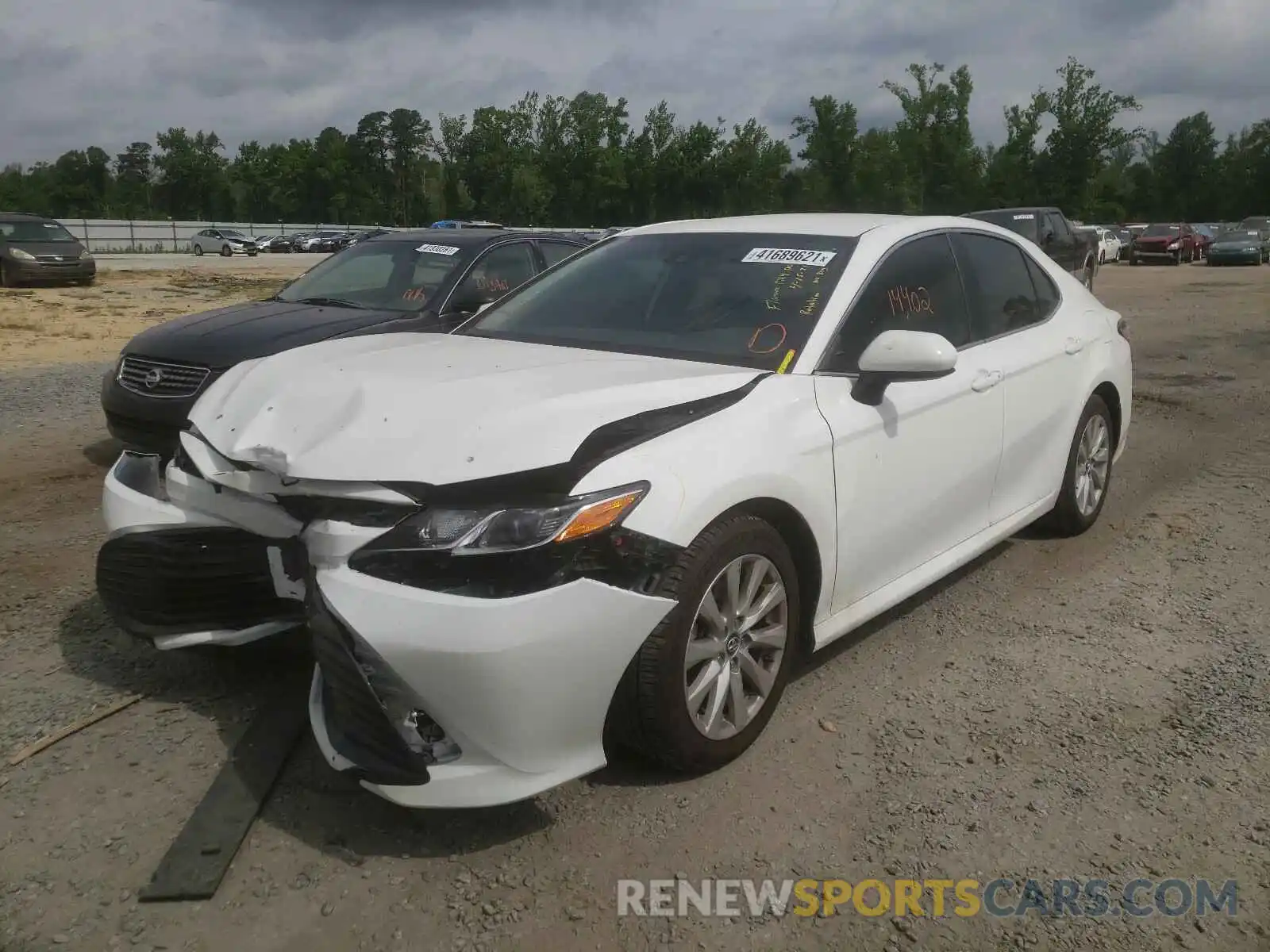 2 Photograph of a damaged car 4T1B11HK6KU721044 TOYOTA CAMRY 2019