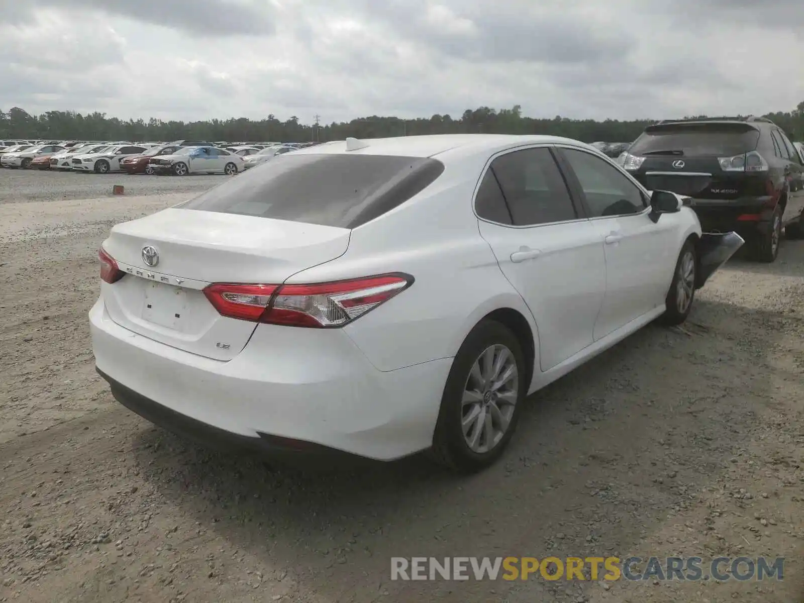 4 Photograph of a damaged car 4T1B11HK6KU721044 TOYOTA CAMRY 2019