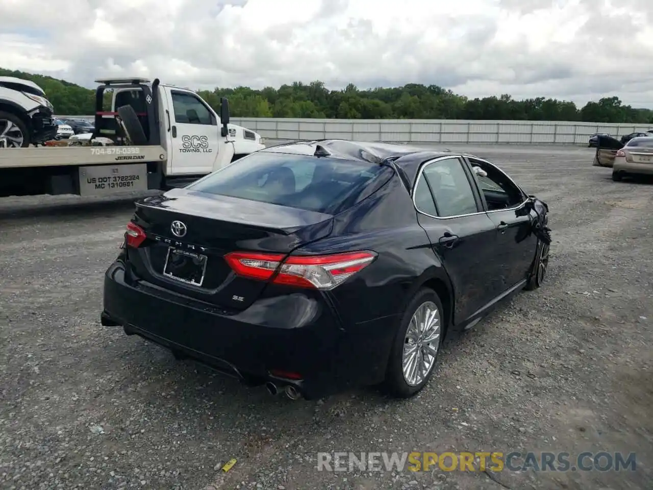 4 Photograph of a damaged car 4T1B11HK6KU722971 TOYOTA CAMRY 2019