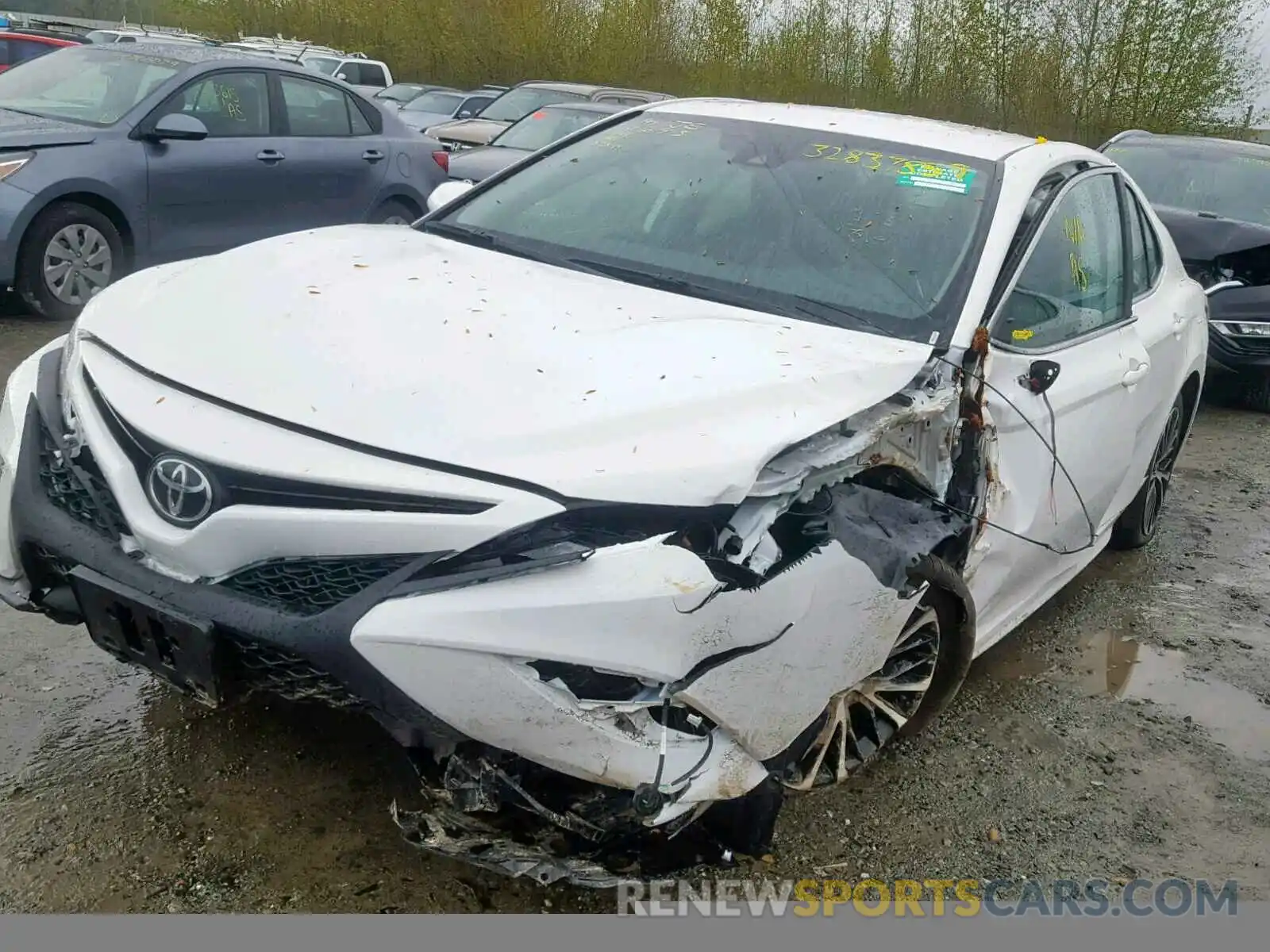 2 Photograph of a damaged car 4T1B11HK6KU724378 TOYOTA CAMRY 2019