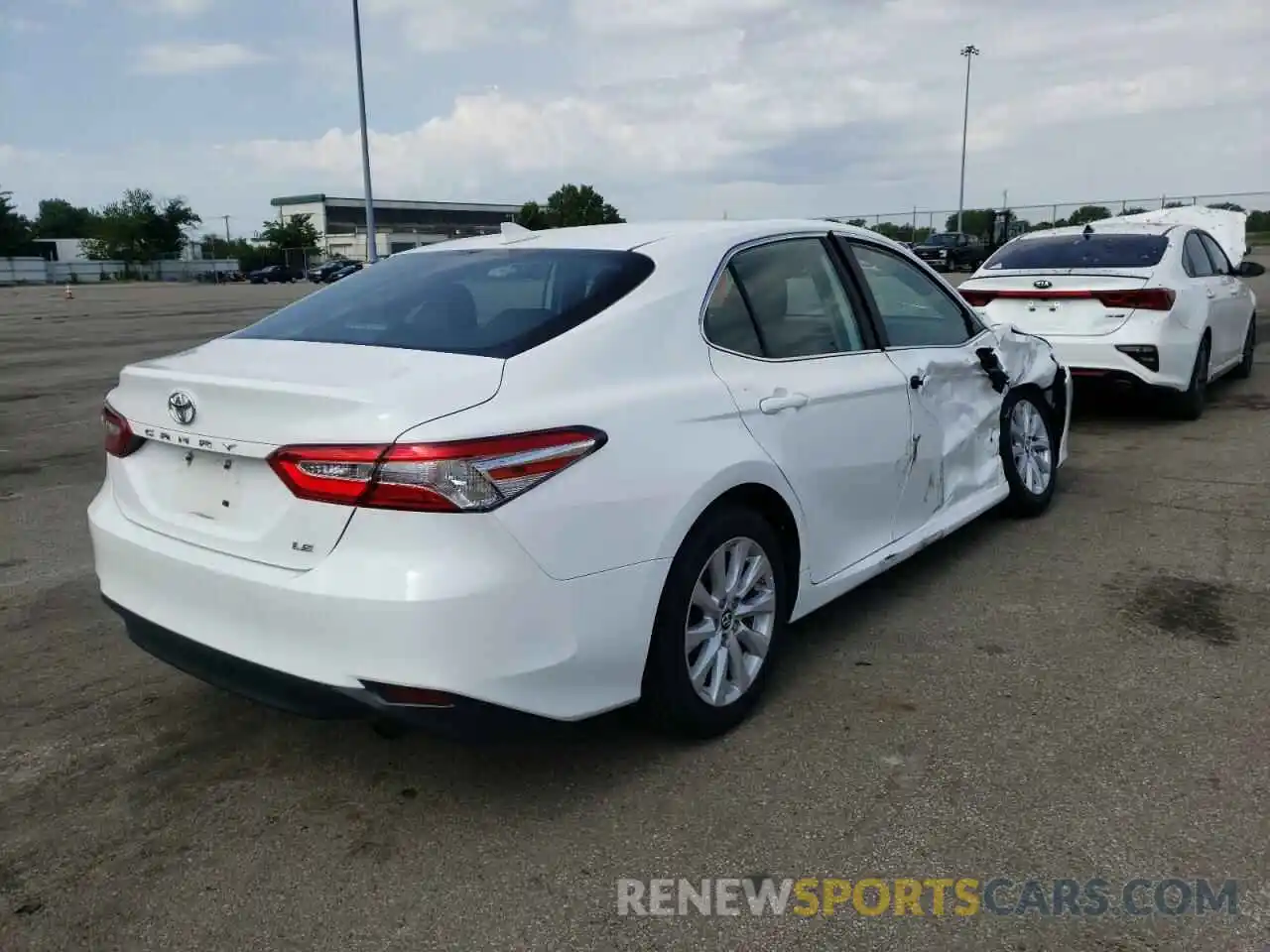 4 Photograph of a damaged car 4T1B11HK6KU725367 TOYOTA CAMRY 2019