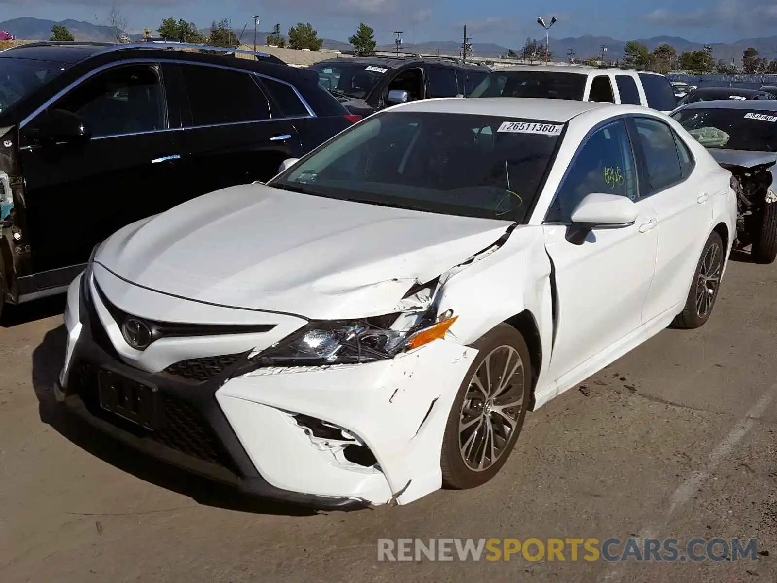 2 Photograph of a damaged car 4T1B11HK6KU725854 TOYOTA CAMRY 2019