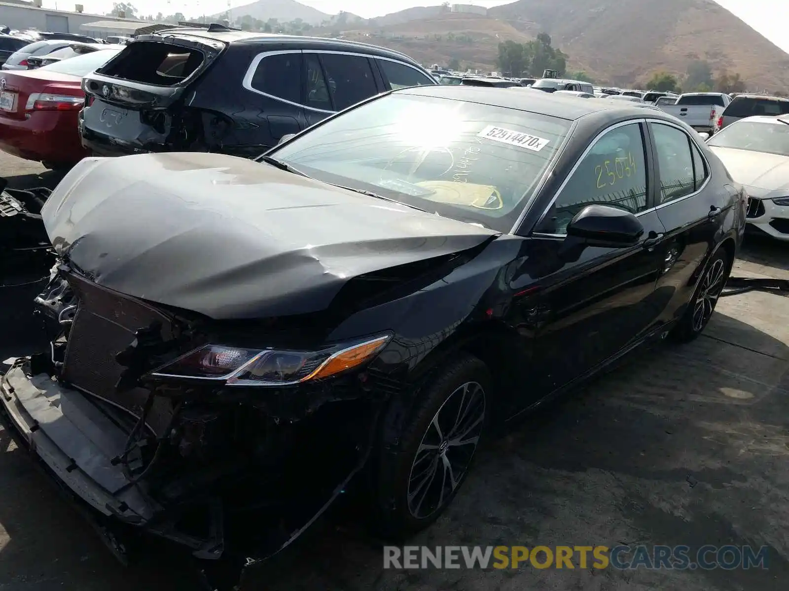 2 Photograph of a damaged car 4T1B11HK6KU726888 TOYOTA CAMRY 2019