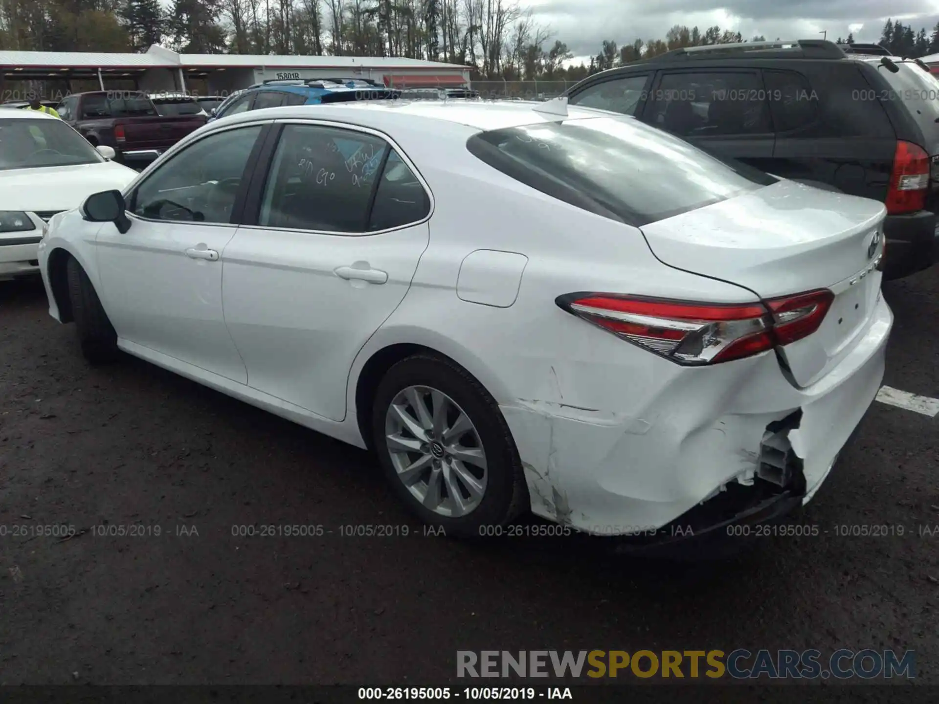 3 Photograph of a damaged car 4T1B11HK6KU729645 TOYOTA CAMRY 2019