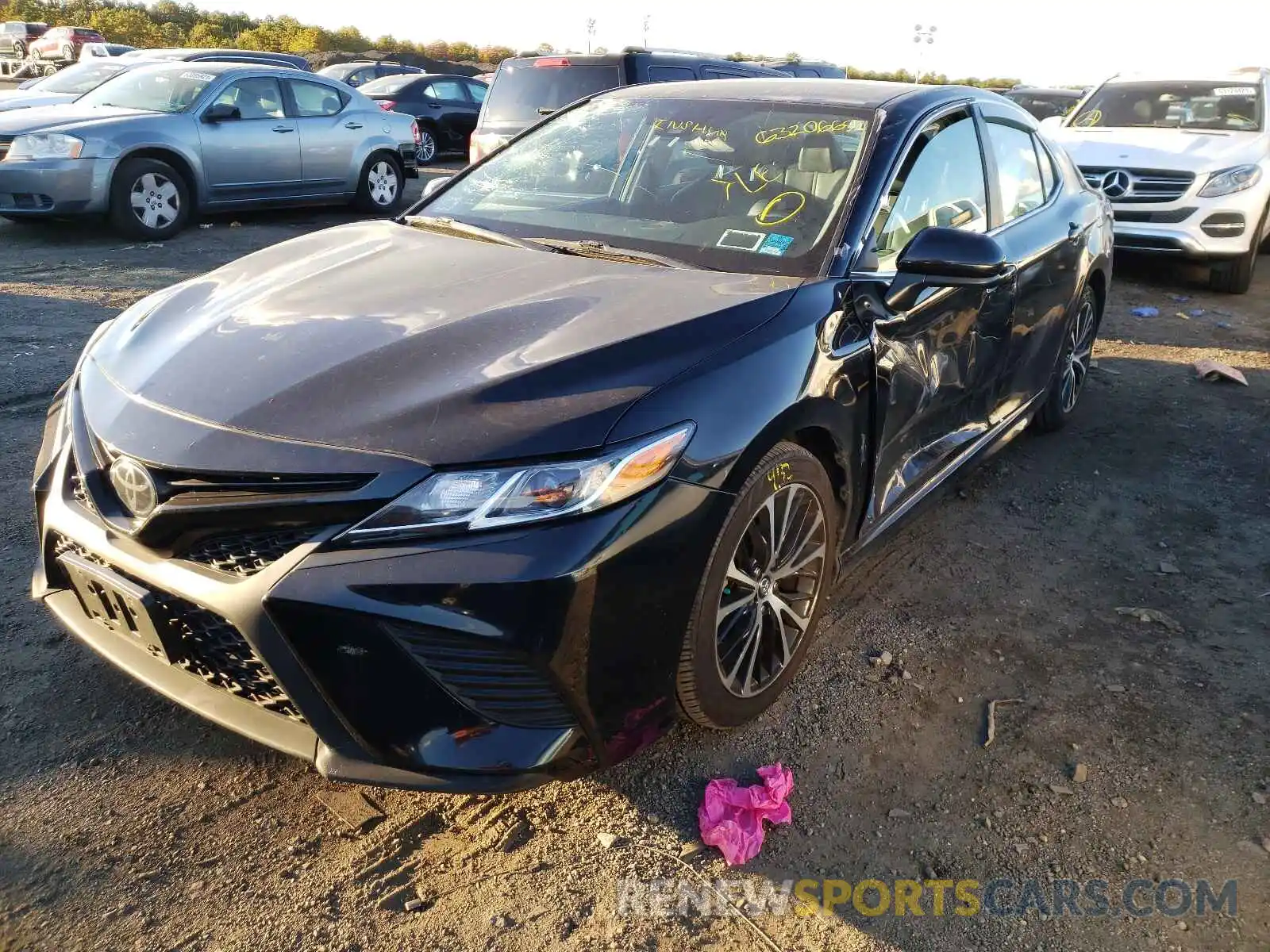 2 Photograph of a damaged car 4T1B11HK6KU729970 TOYOTA CAMRY 2019