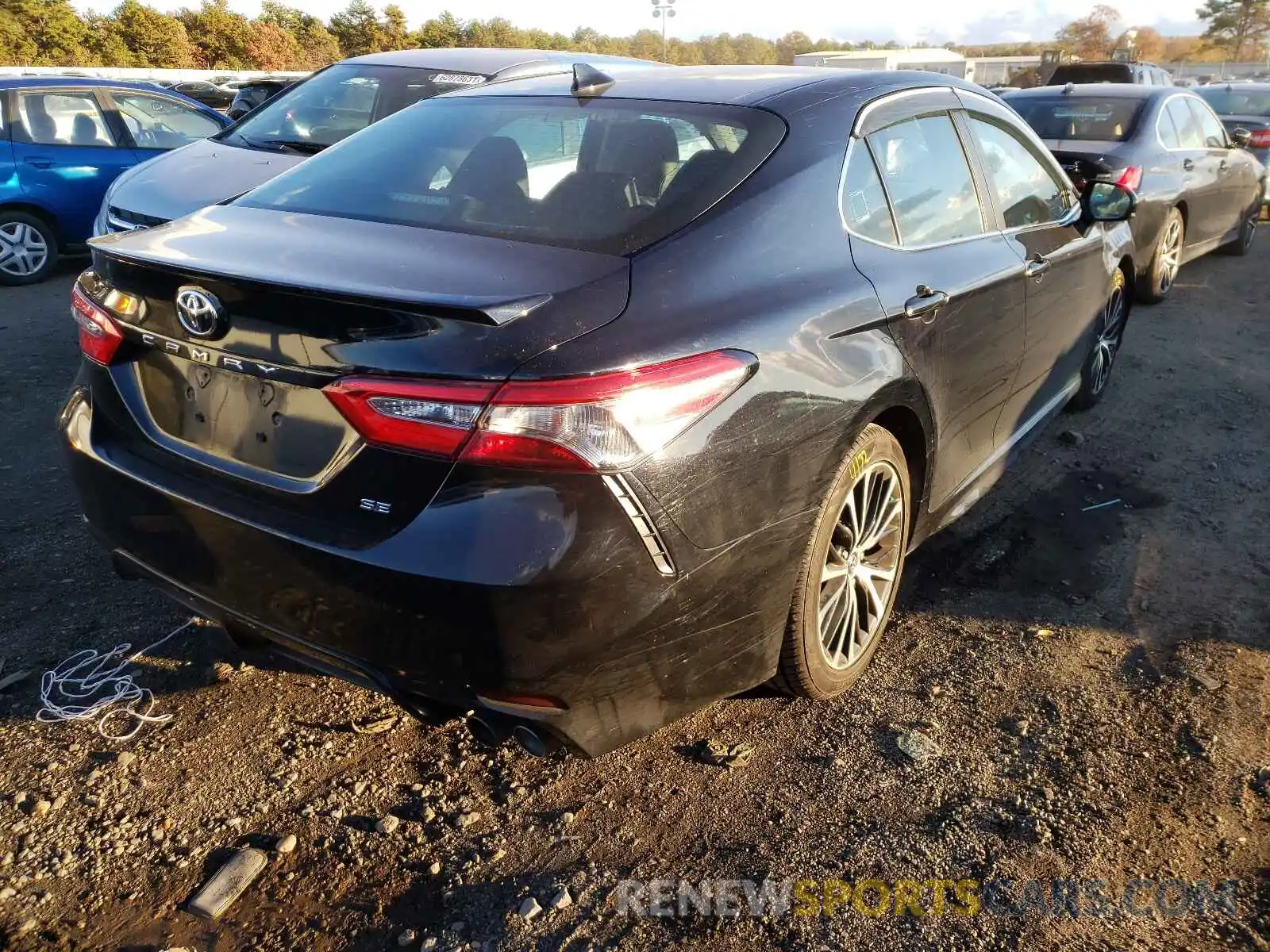 4 Photograph of a damaged car 4T1B11HK6KU729970 TOYOTA CAMRY 2019