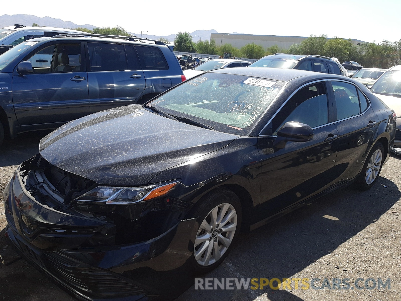 2 Photograph of a damaged car 4T1B11HK6KU730102 TOYOTA CAMRY 2019