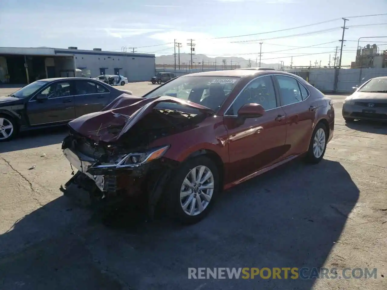 2 Photograph of a damaged car 4T1B11HK6KU734697 TOYOTA CAMRY 2019