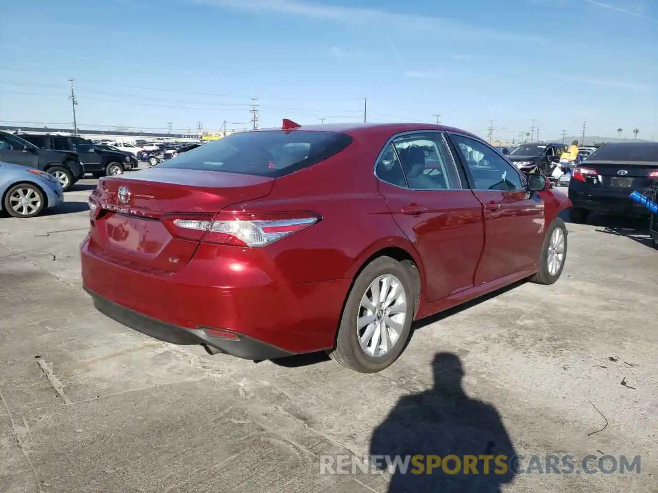 4 Photograph of a damaged car 4T1B11HK6KU734697 TOYOTA CAMRY 2019