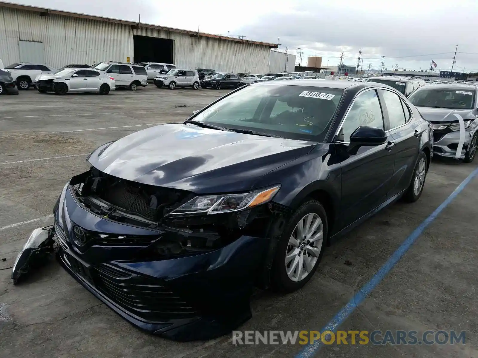 2 Photograph of a damaged car 4T1B11HK6KU737938 TOYOTA CAMRY 2019