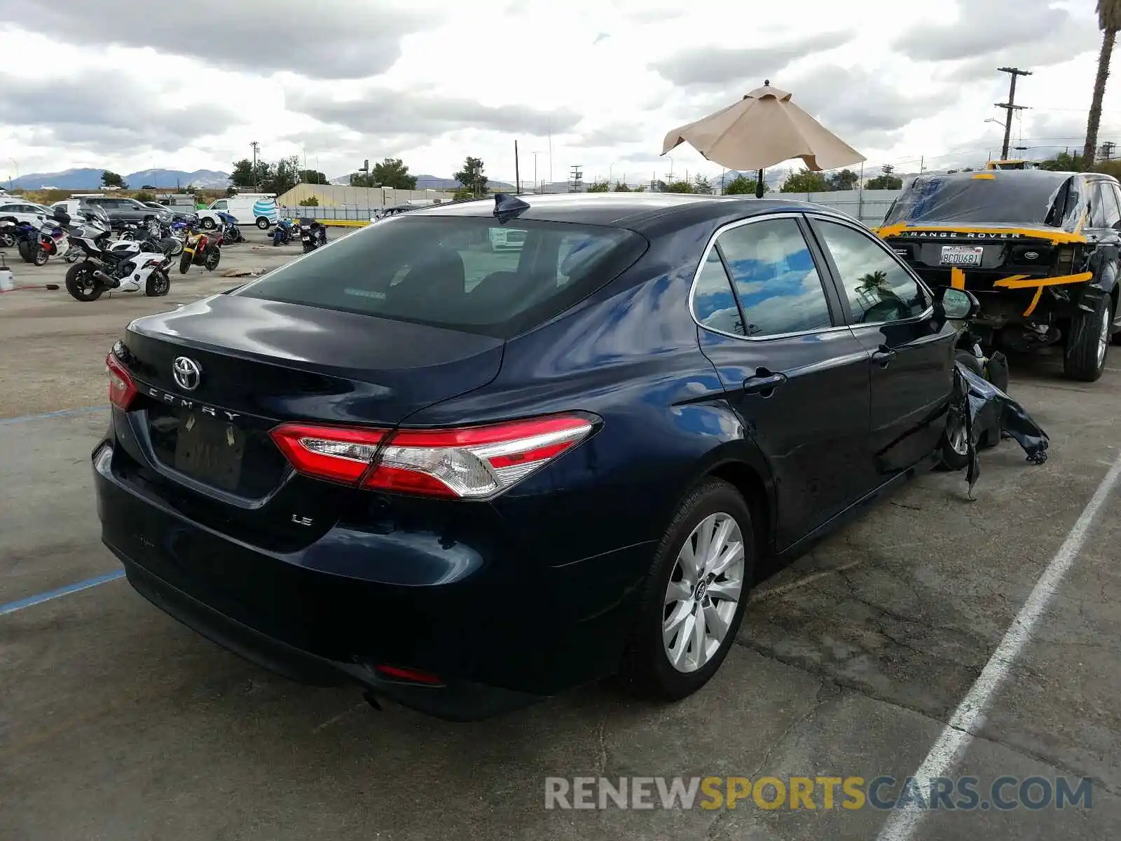 4 Photograph of a damaged car 4T1B11HK6KU737938 TOYOTA CAMRY 2019