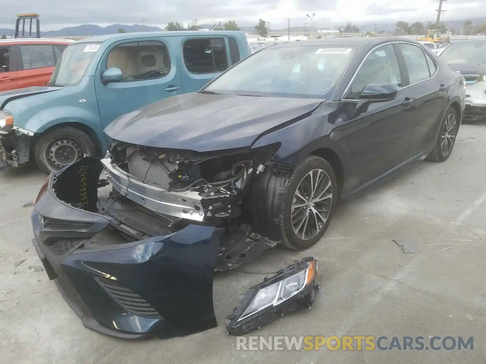 2 Photograph of a damaged car 4T1B11HK6KU739897 TOYOTA CAMRY 2019