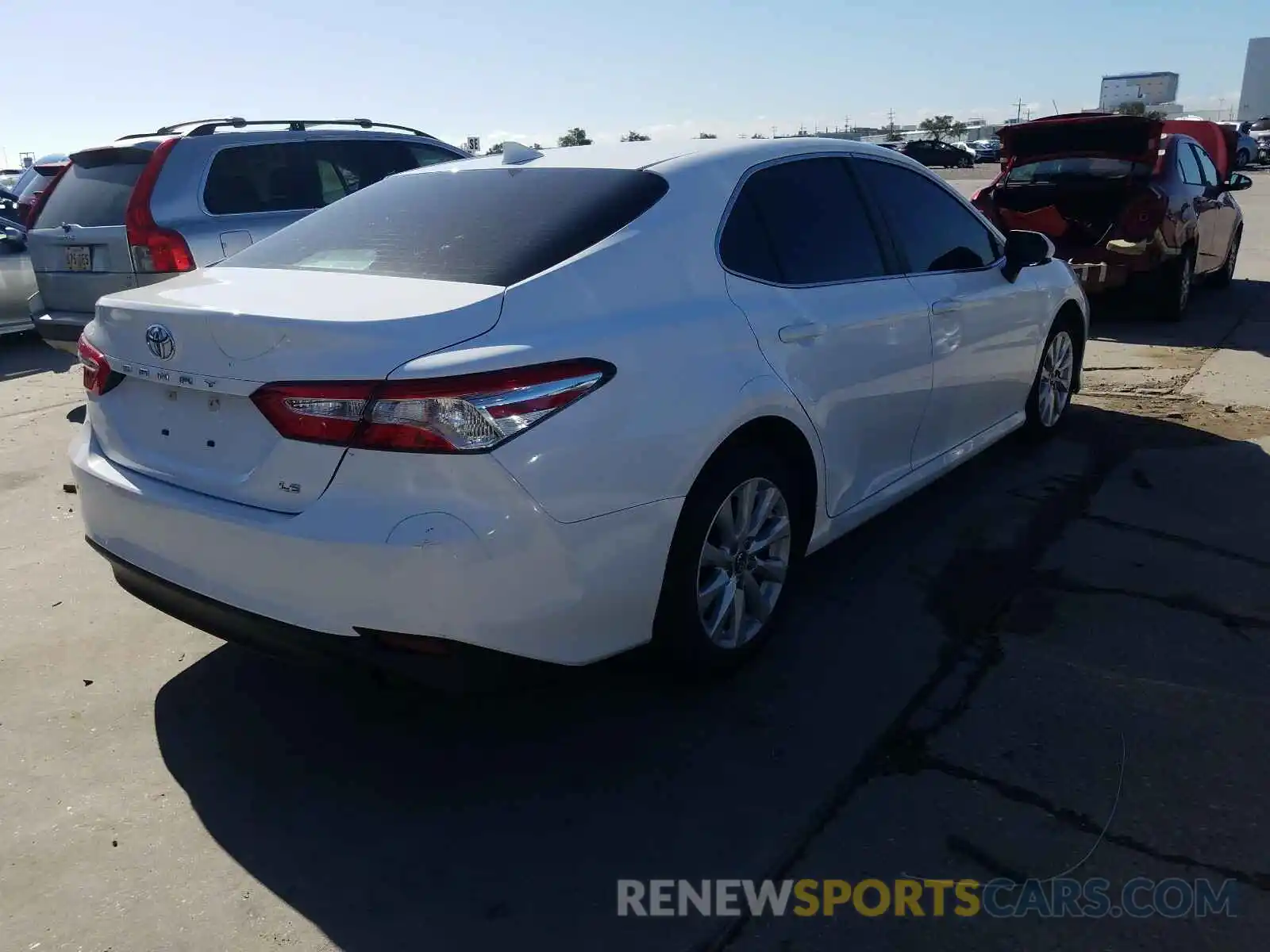 4 Photograph of a damaged car 4T1B11HK6KU742508 TOYOTA CAMRY 2019