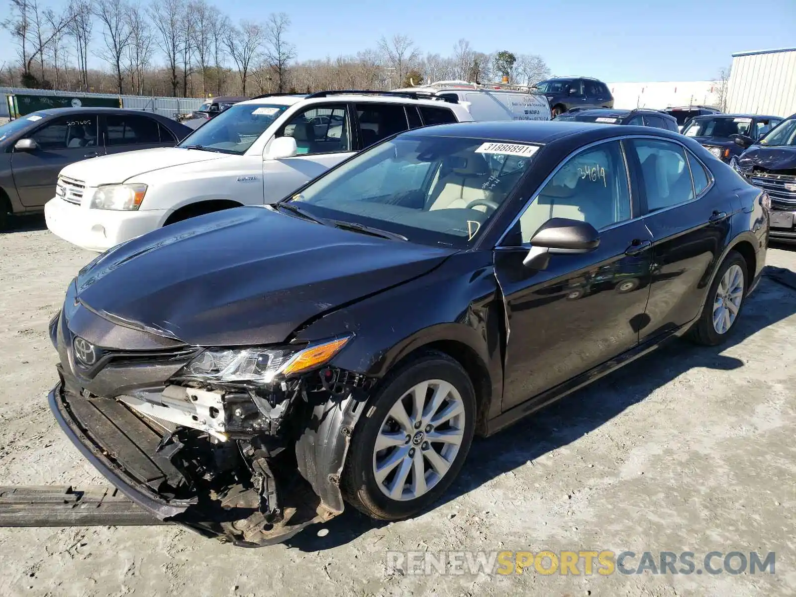 2 Photograph of a damaged car 4T1B11HK6KU744470 TOYOTA CAMRY 2019