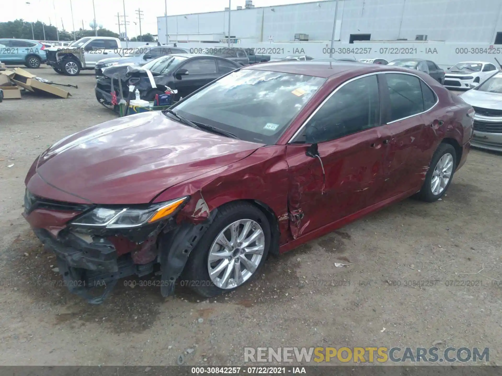 2 Photograph of a damaged car 4T1B11HK6KU744579 TOYOTA CAMRY 2019