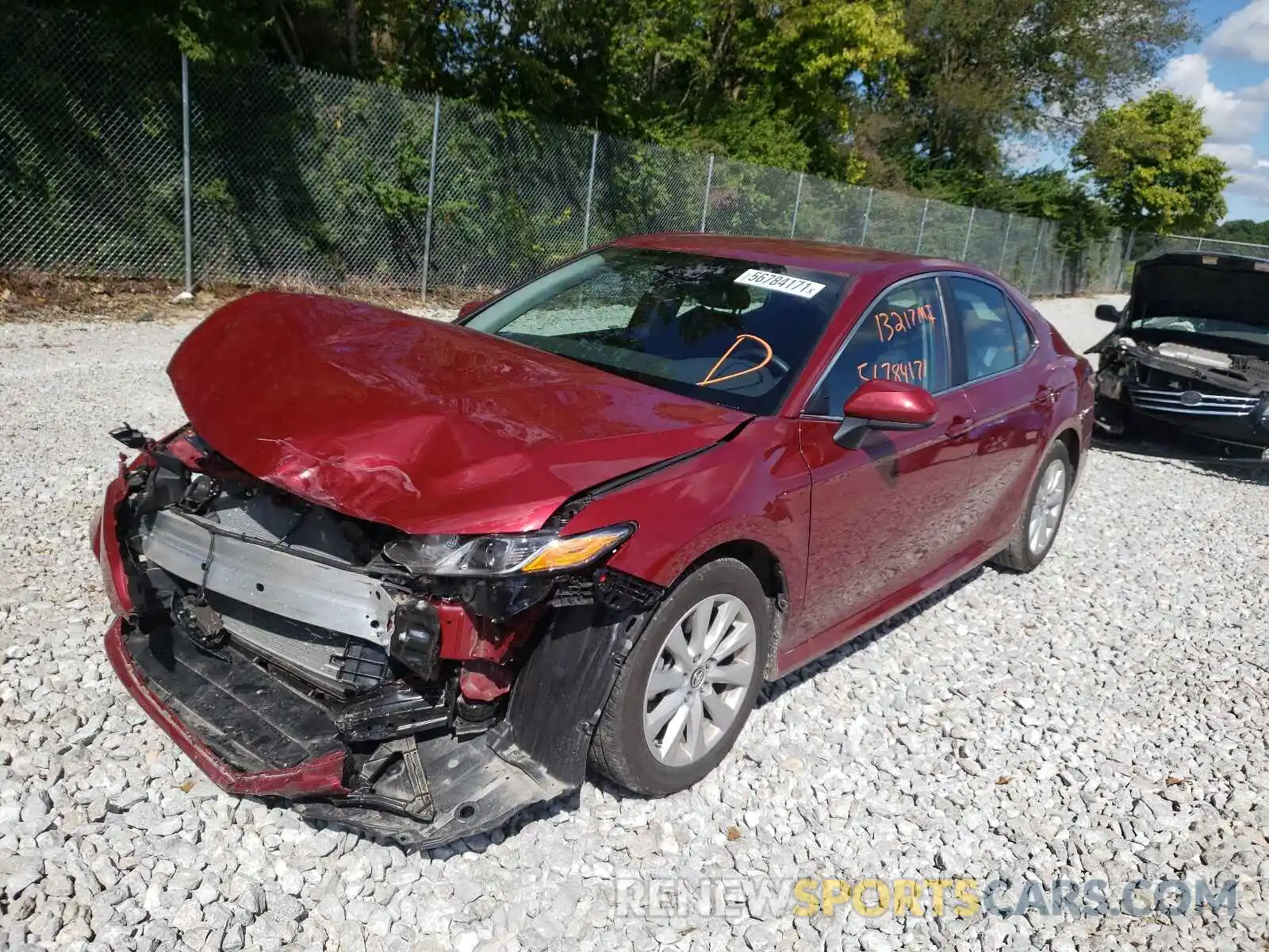 2 Photograph of a damaged car 4T1B11HK6KU745554 TOYOTA CAMRY 2019