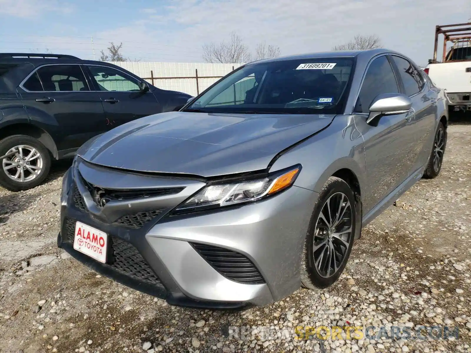 2 Photograph of a damaged car 4T1B11HK6KU746851 TOYOTA CAMRY 2019