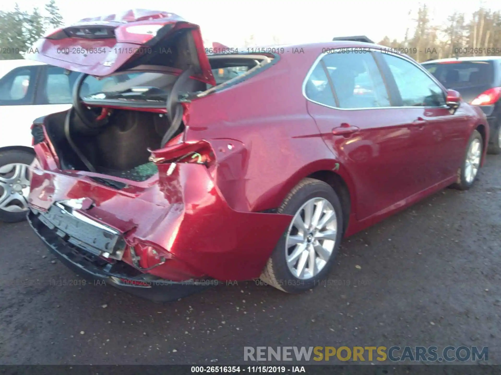 4 Photograph of a damaged car 4T1B11HK6KU747627 TOYOTA CAMRY 2019