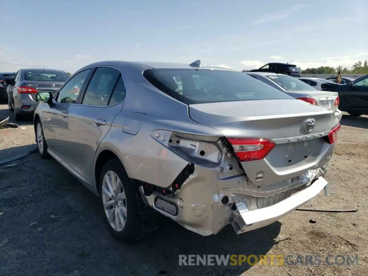 3 Photograph of a damaged car 4T1B11HK6KU749801 TOYOTA CAMRY 2019