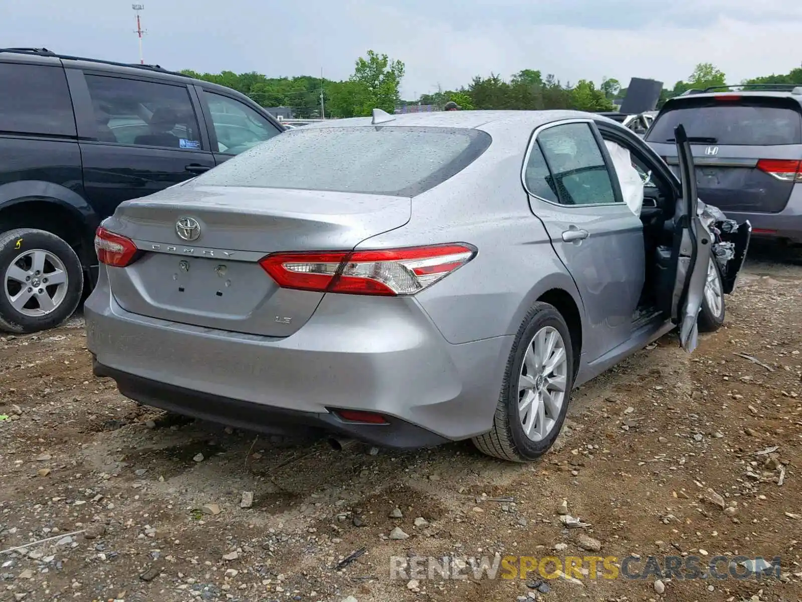 4 Photograph of a damaged car 4T1B11HK6KU749894 TOYOTA CAMRY 2019