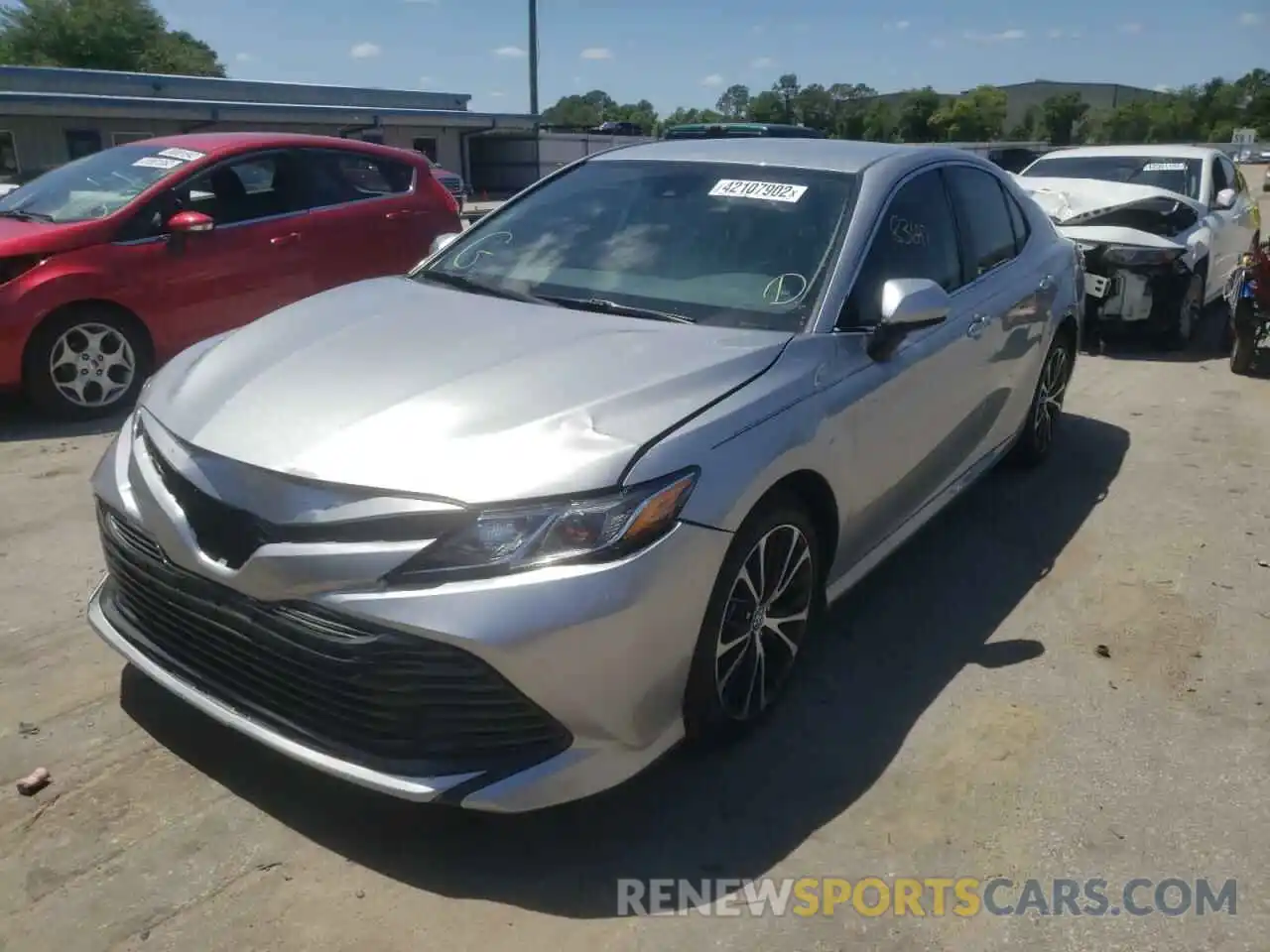 2 Photograph of a damaged car 4T1B11HK6KU751032 TOYOTA CAMRY 2019