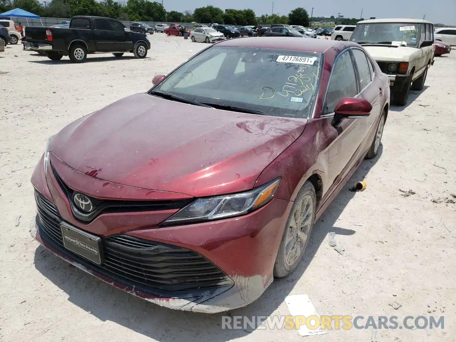 2 Photograph of a damaged car 4T1B11HK6KU753024 TOYOTA CAMRY 2019