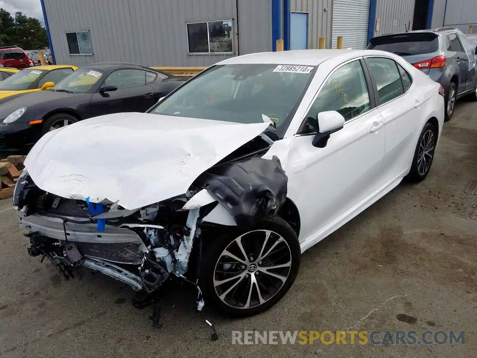 2 Photograph of a damaged car 4T1B11HK6KU754304 TOYOTA CAMRY 2019