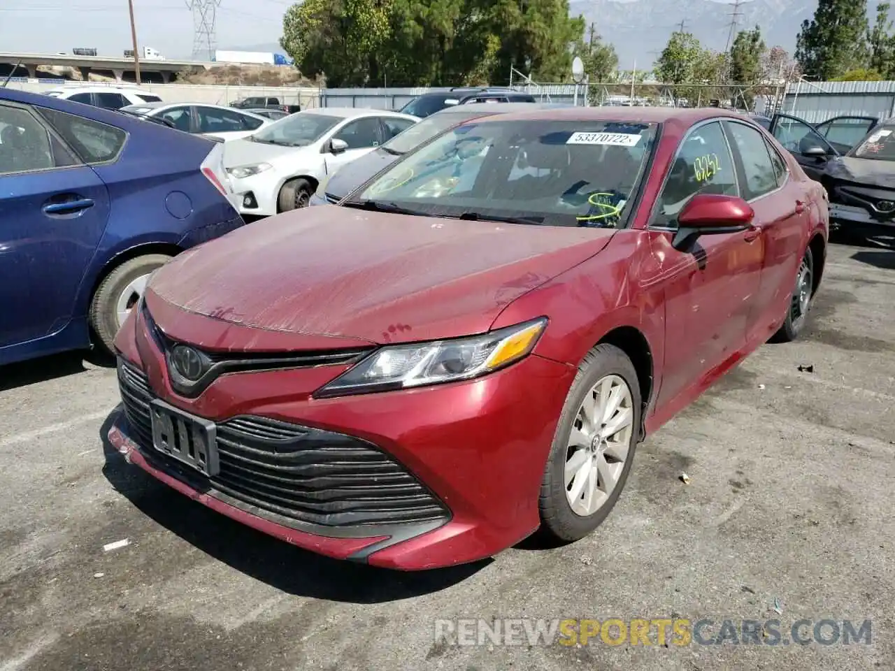 2 Photograph of a damaged car 4T1B11HK6KU754660 TOYOTA CAMRY 2019