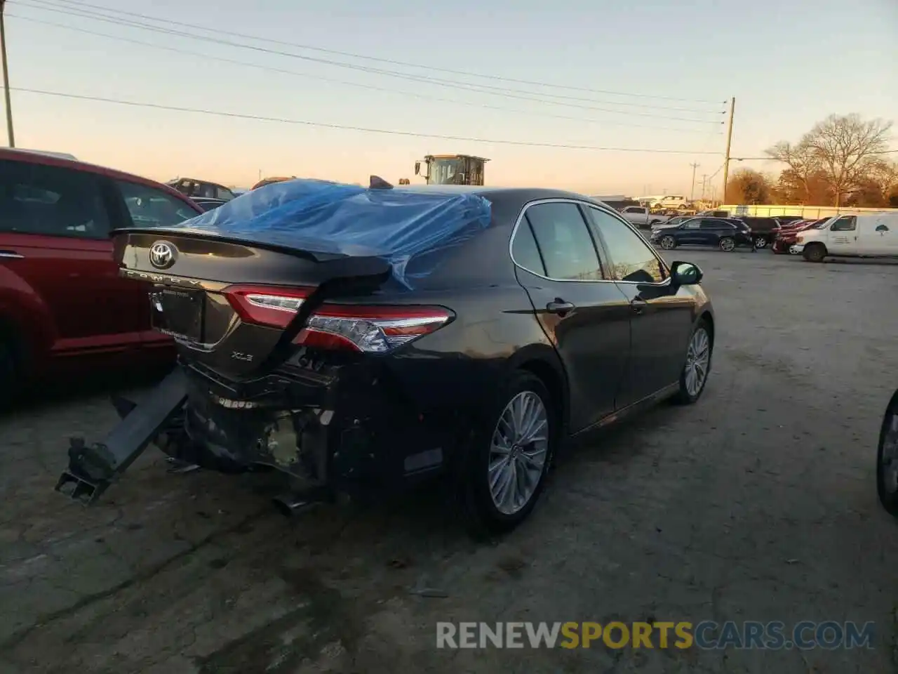 4 Photograph of a damaged car 4T1B11HK6KU757350 TOYOTA CAMRY 2019