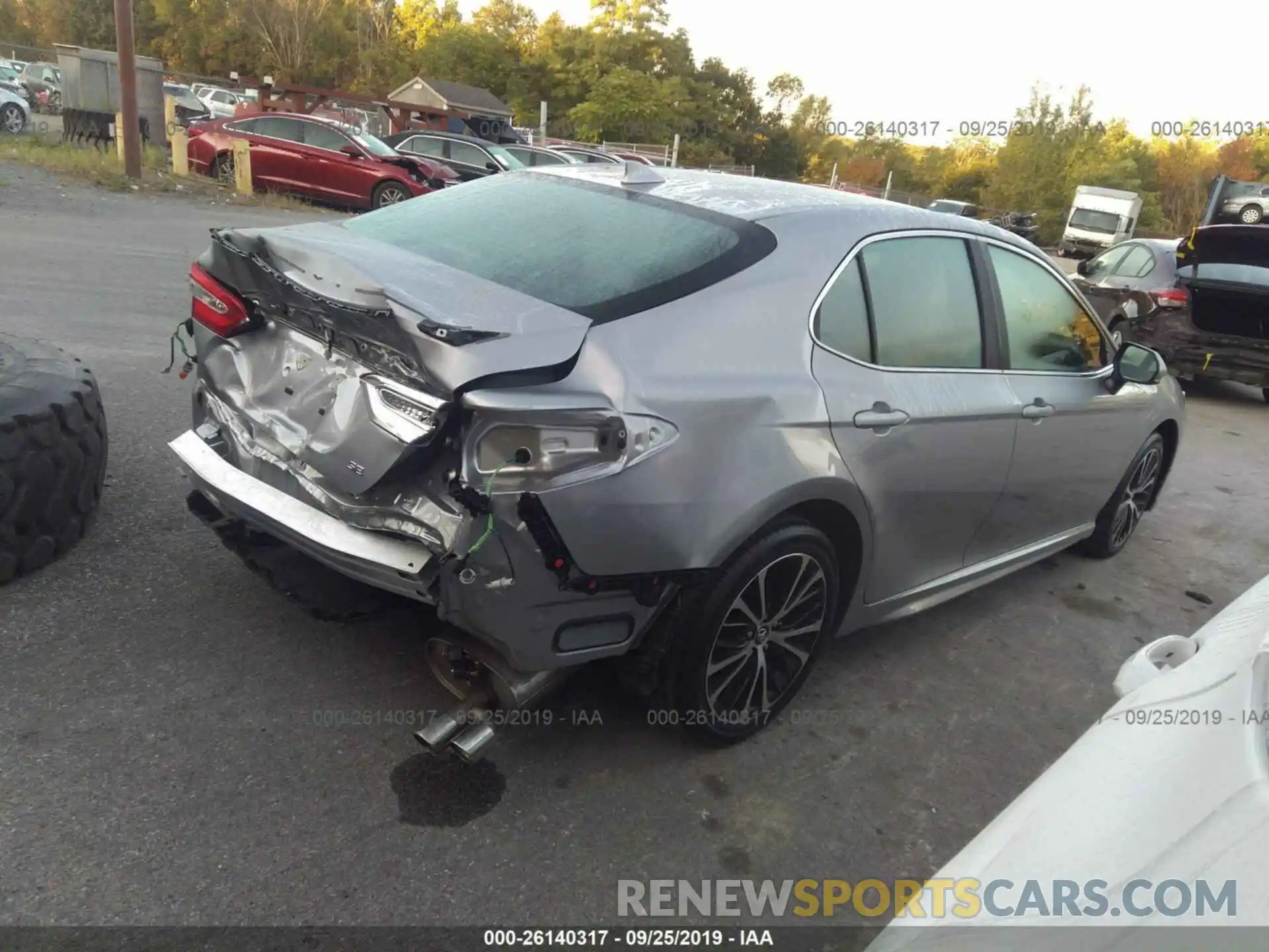 4 Photograph of a damaged car 4T1B11HK6KU758675 TOYOTA CAMRY 2019