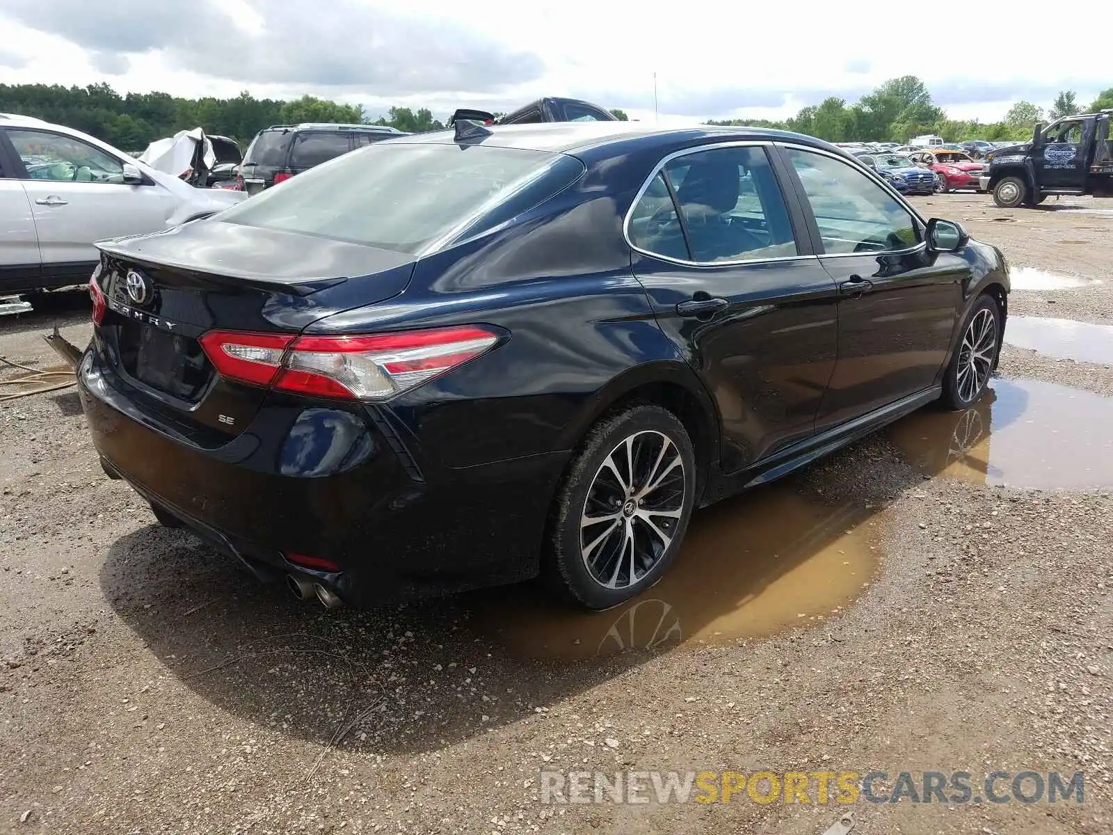 4 Photograph of a damaged car 4T1B11HK6KU758739 TOYOTA CAMRY 2019