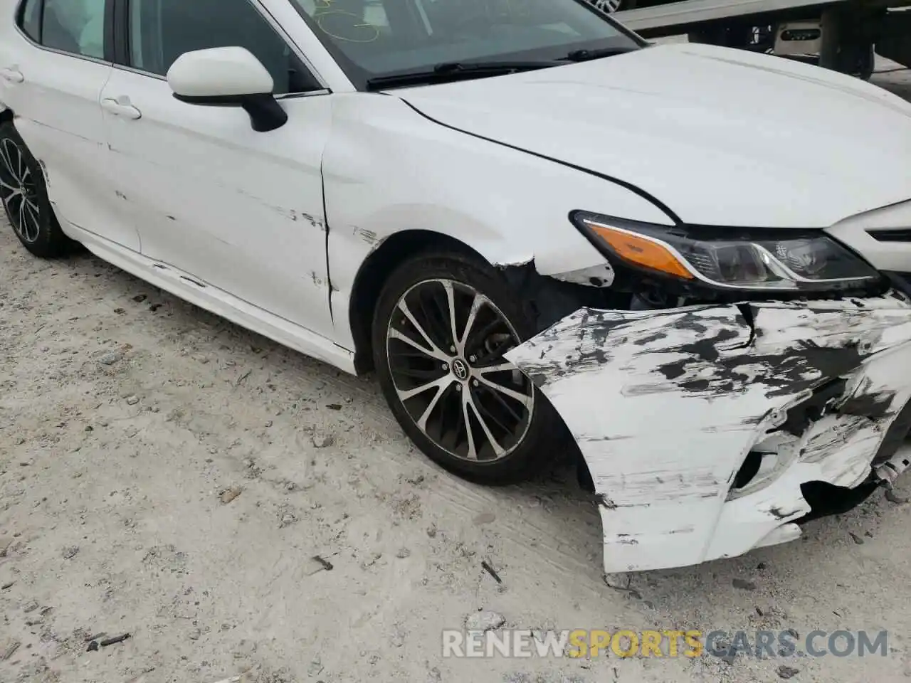 9 Photograph of a damaged car 4T1B11HK6KU759678 TOYOTA CAMRY 2019