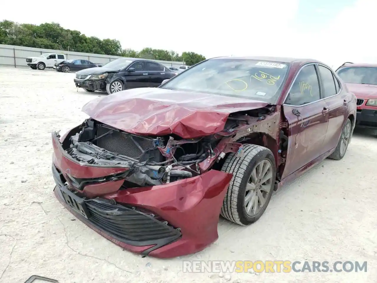 2 Photograph of a damaged car 4T1B11HK6KU761012 TOYOTA CAMRY 2019