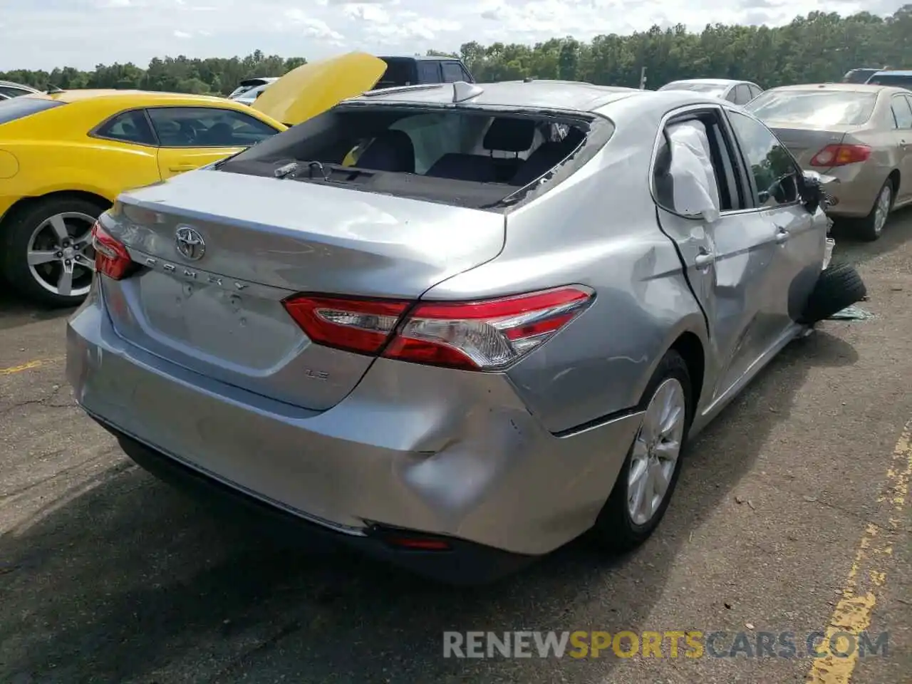 4 Photograph of a damaged car 4T1B11HK6KU761804 TOYOTA CAMRY 2019