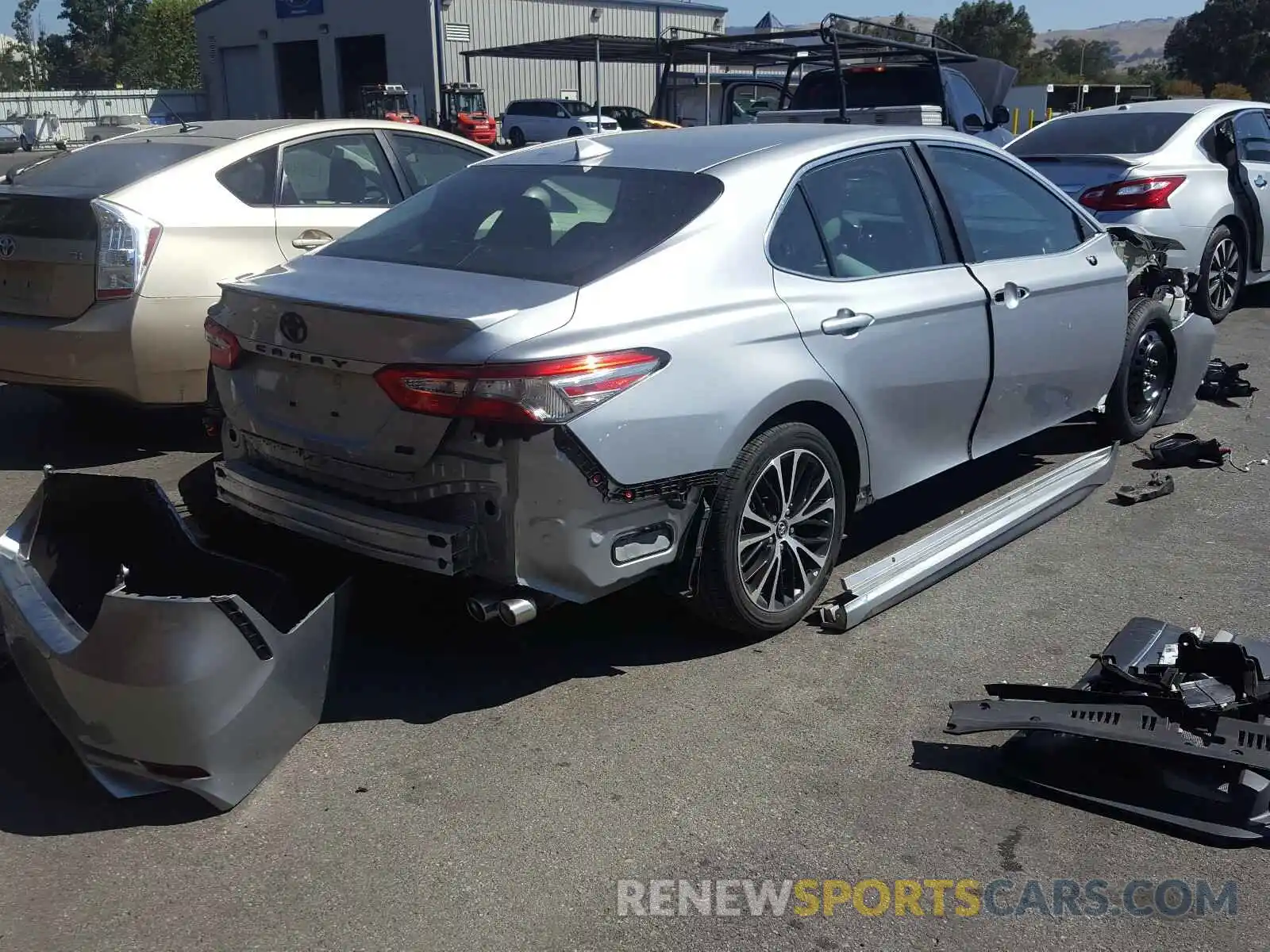 4 Photograph of a damaged car 4T1B11HK6KU762239 TOYOTA CAMRY 2019