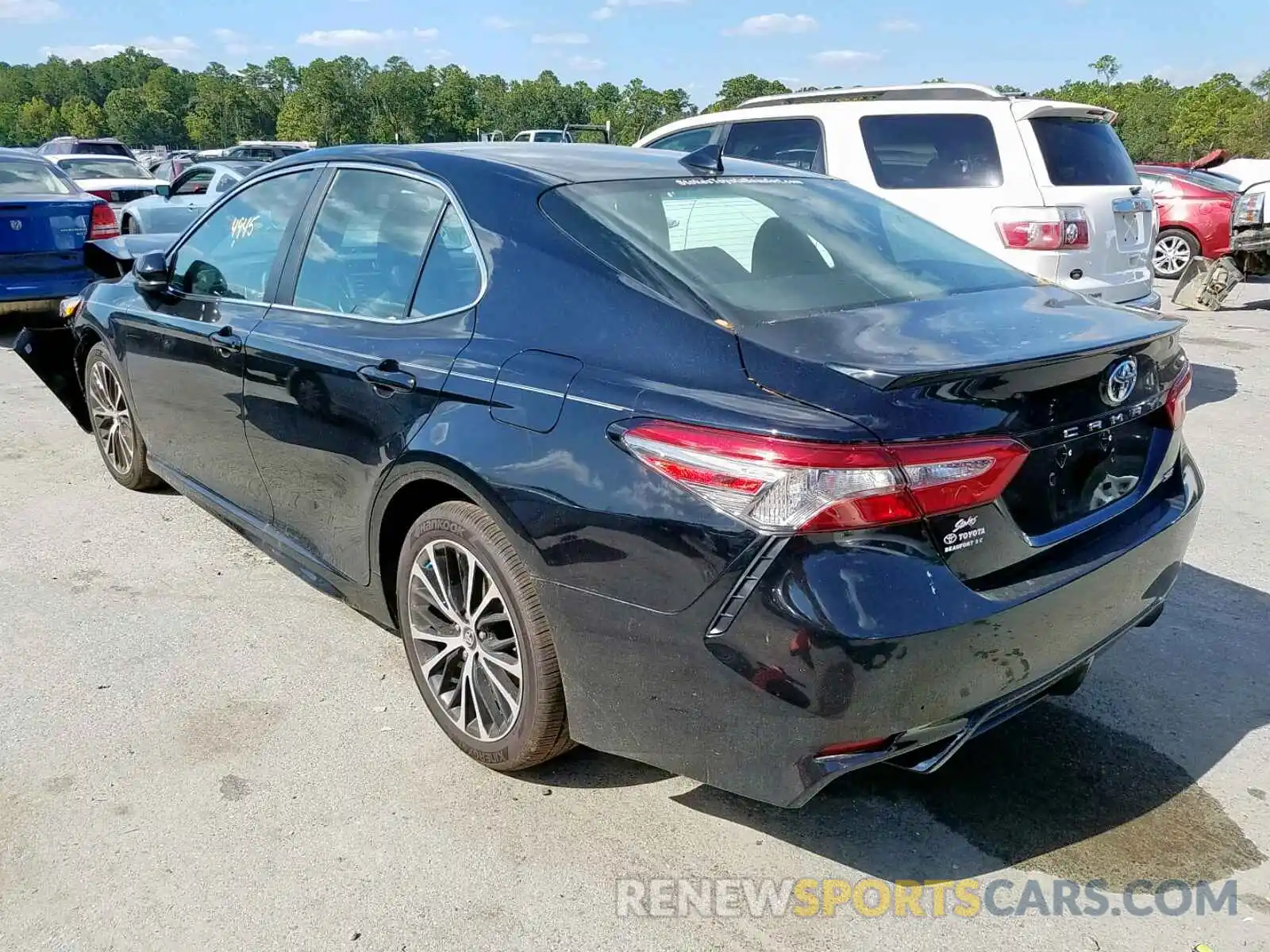 3 Photograph of a damaged car 4T1B11HK6KU766811 TOYOTA CAMRY 2019