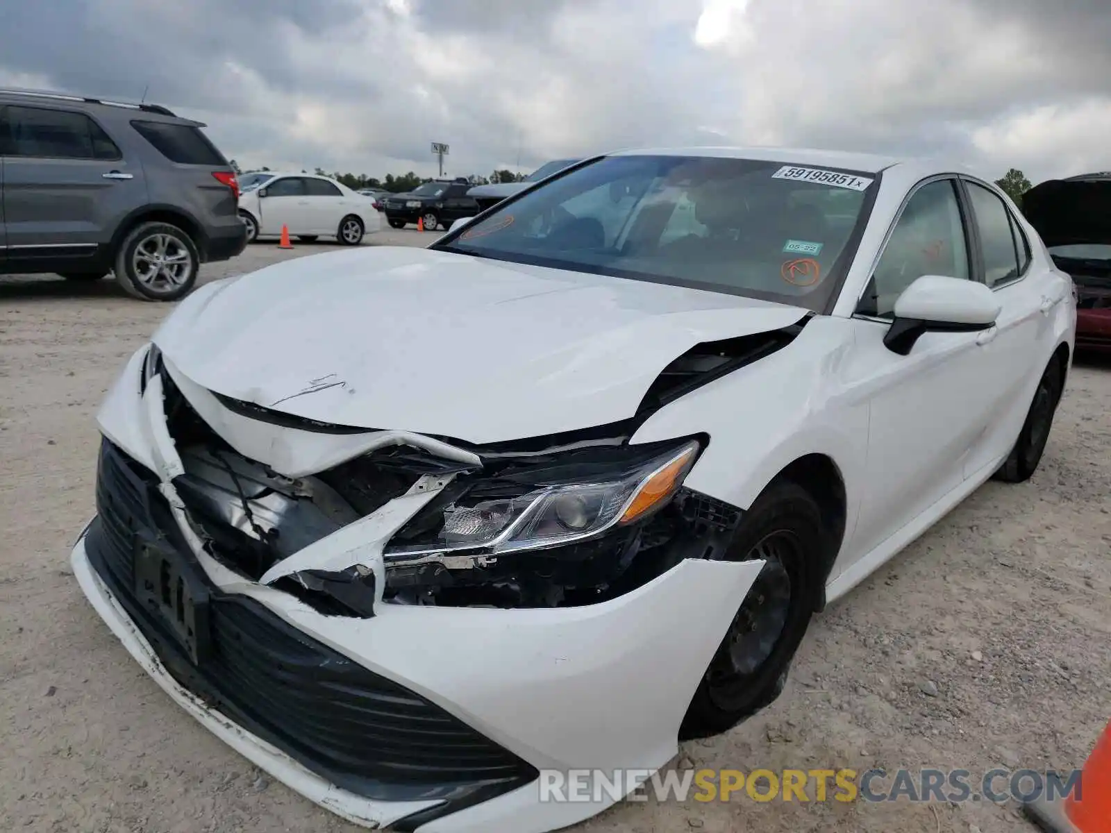 2 Photograph of a damaged car 4T1B11HK6KU769479 TOYOTA CAMRY 2019