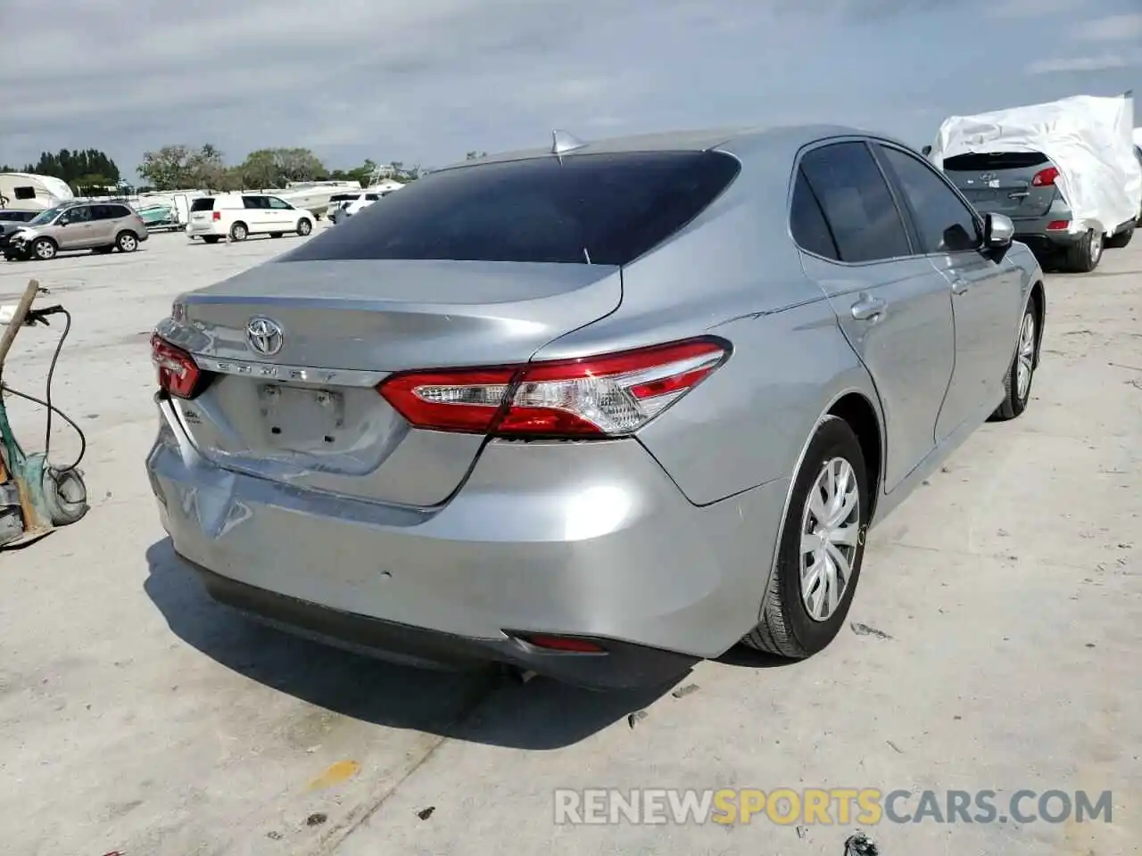 4 Photograph of a damaged car 4T1B11HK6KU771927 TOYOTA CAMRY 2019