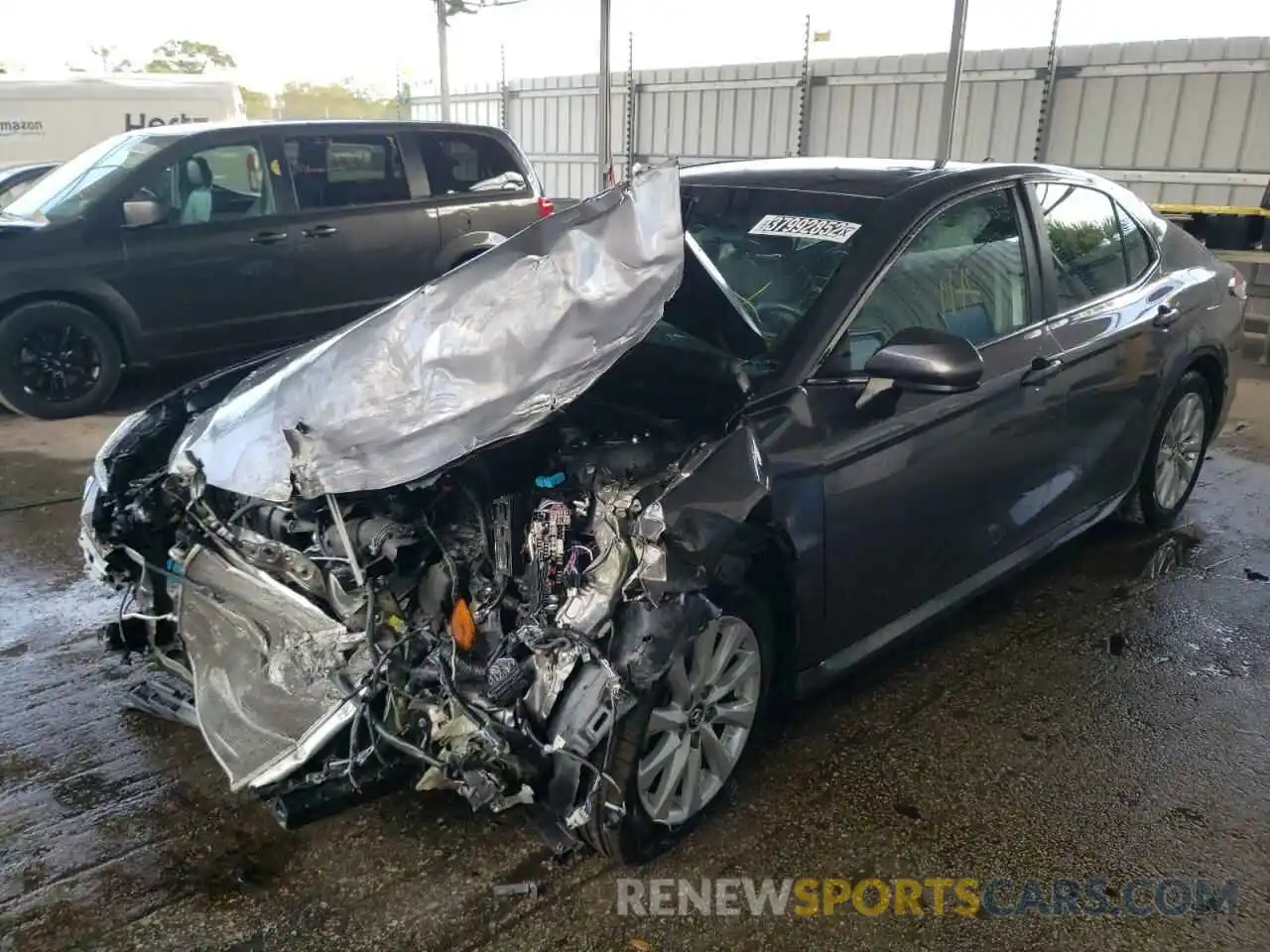 2 Photograph of a damaged car 4T1B11HK6KU773497 TOYOTA CAMRY 2019