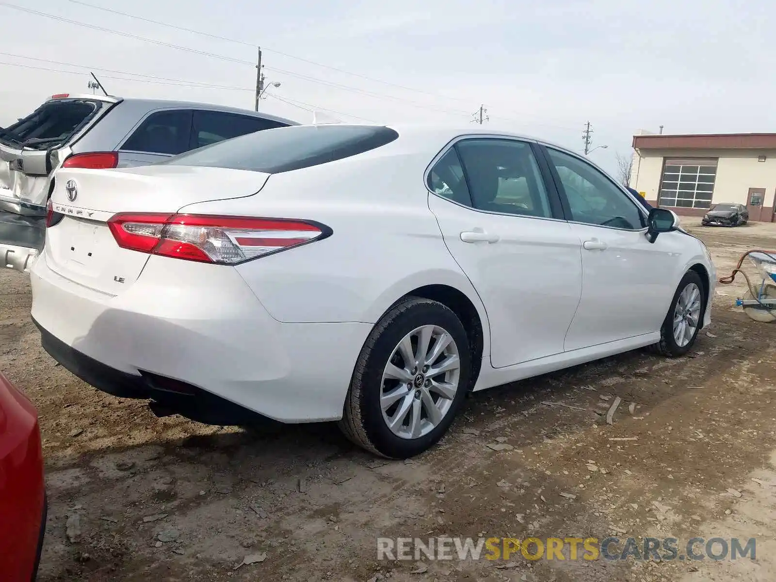 4 Photograph of a damaged car 4T1B11HK6KU773984 TOYOTA CAMRY 2019