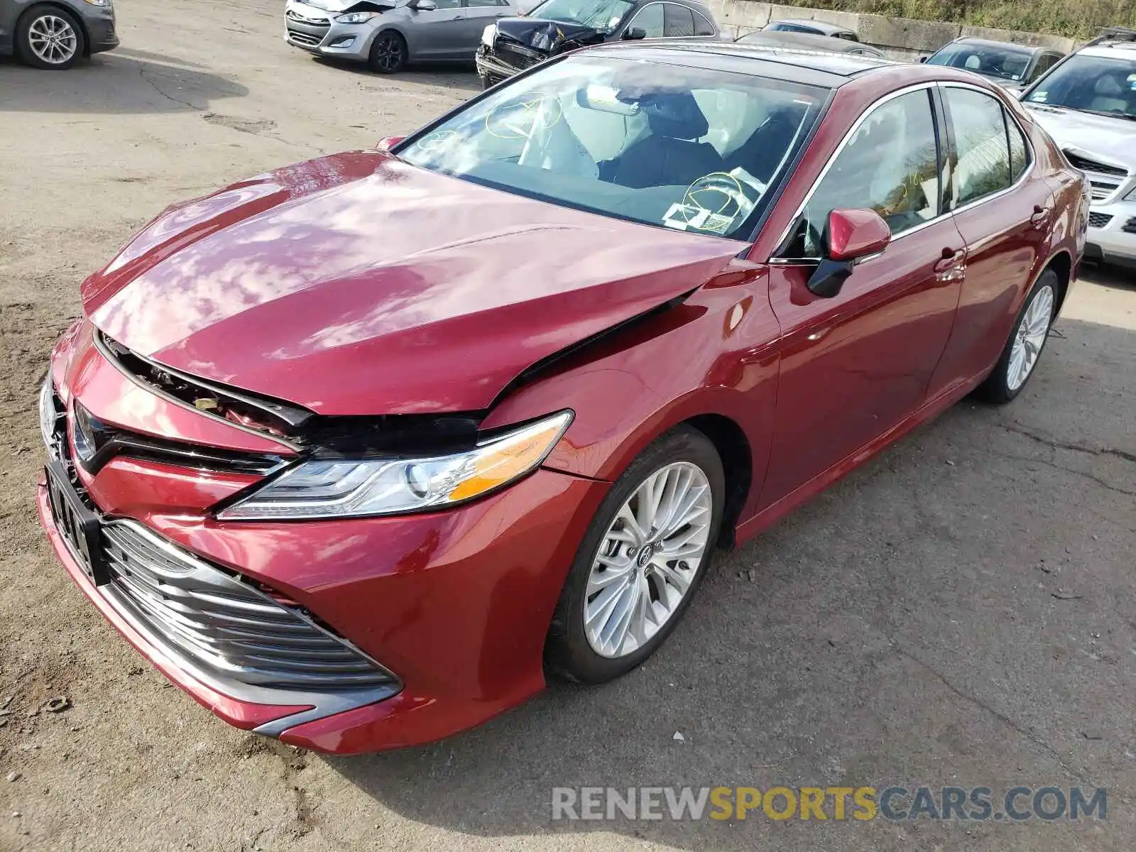 2 Photograph of a damaged car 4T1B11HK6KU775508 TOYOTA CAMRY 2019