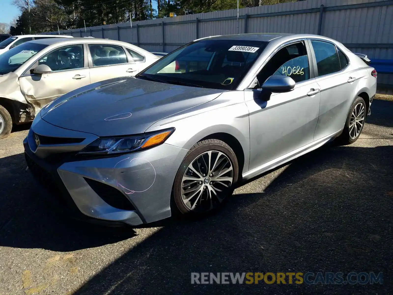 2 Photograph of a damaged car 4T1B11HK6KU778439 TOYOTA CAMRY 2019