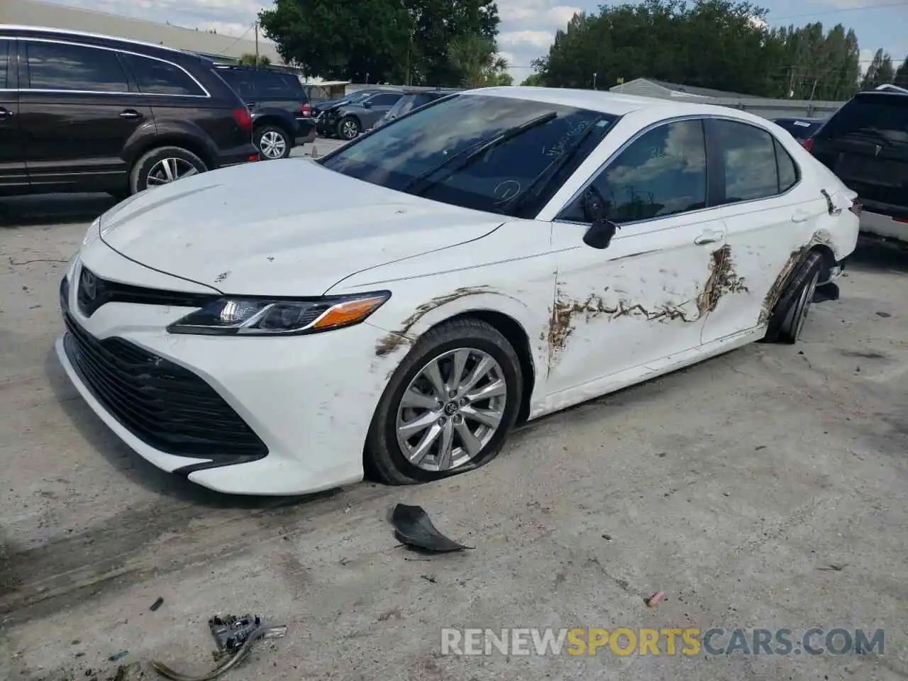 2 Photograph of a damaged car 4T1B11HK6KU781468 TOYOTA CAMRY 2019