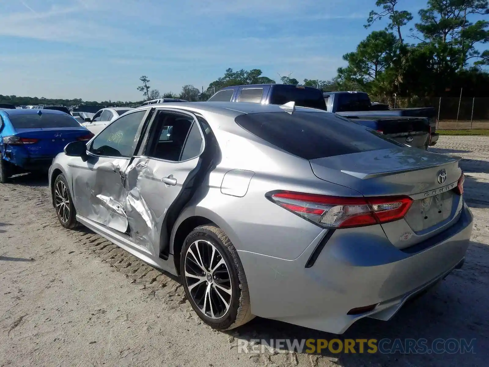 3 Photograph of a damaged car 4T1B11HK6KU781602 TOYOTA CAMRY 2019