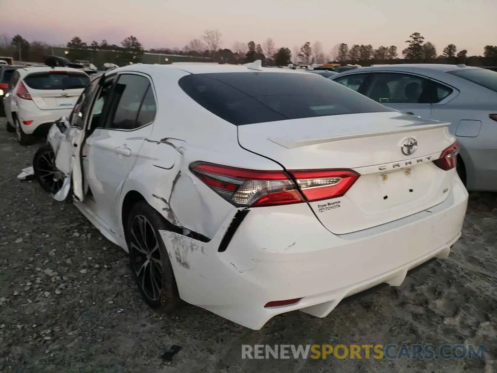 3 Photograph of a damaged car 4T1B11HK6KU782331 TOYOTA CAMRY 2019