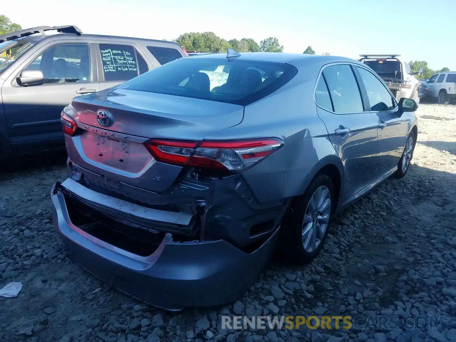 4 Photograph of a damaged car 4T1B11HK6KU782569 TOYOTA CAMRY 2019