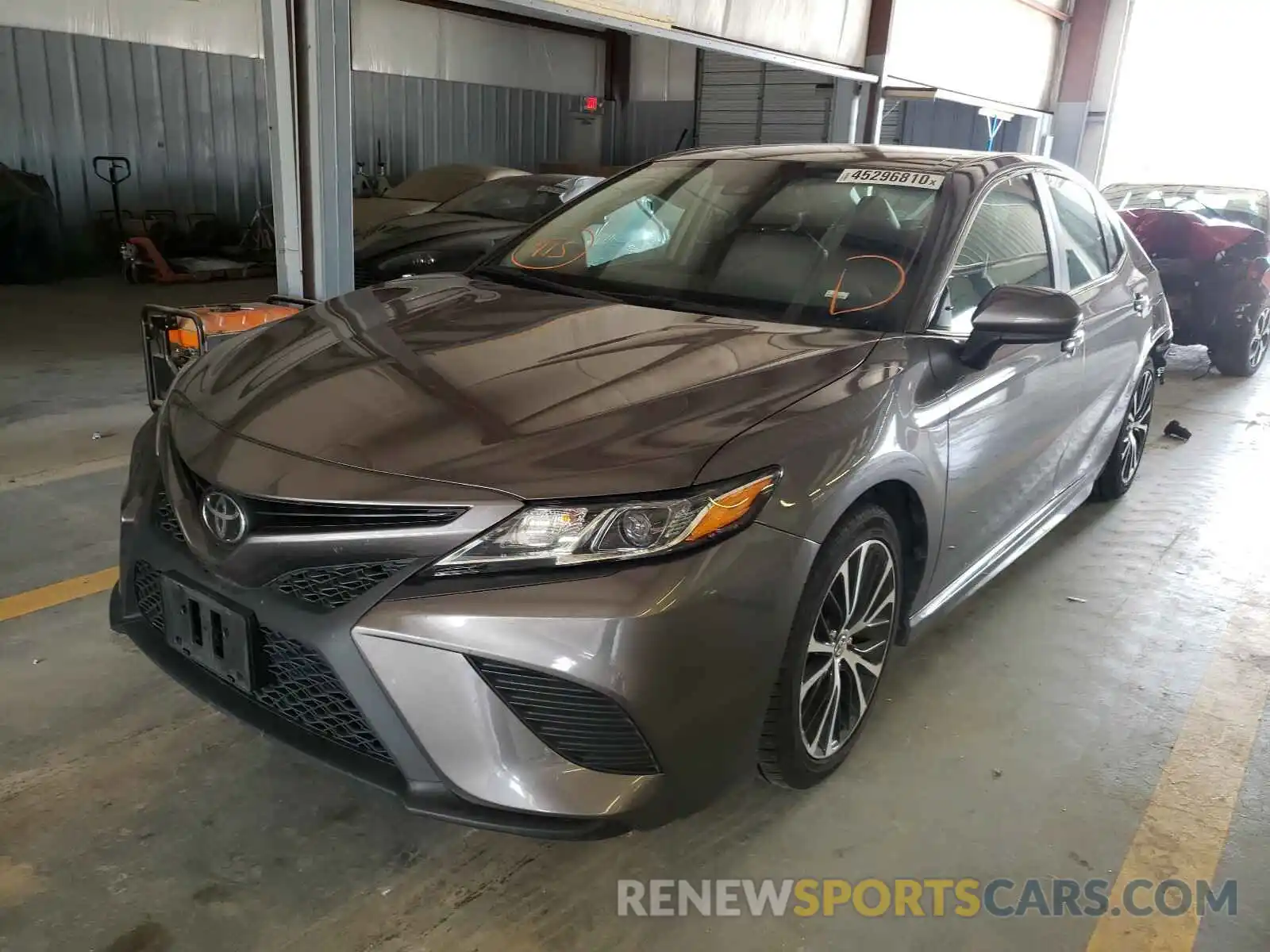 2 Photograph of a damaged car 4T1B11HK6KU784239 TOYOTA CAMRY 2019